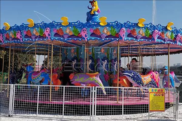 Large Upper Drive Carnival Carousel with sea creatures horses in Dinis