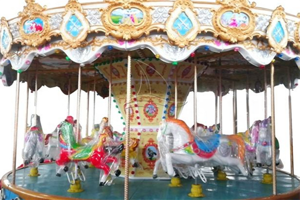 outdoor Christmas fairground carousel in DInis