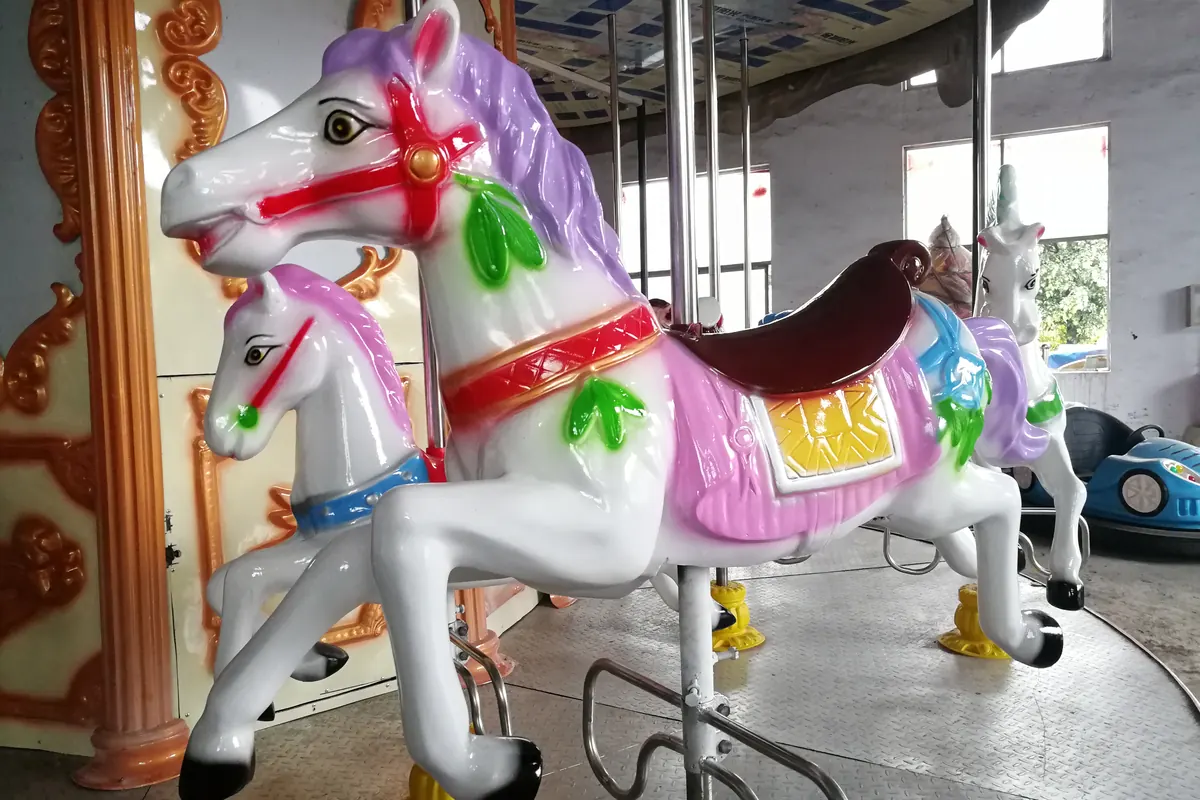 Carousel figure painting styles at the factory