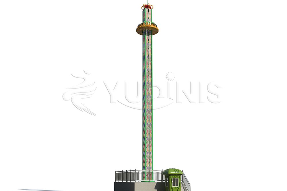free fall drop tower ride in operation at an amusement park