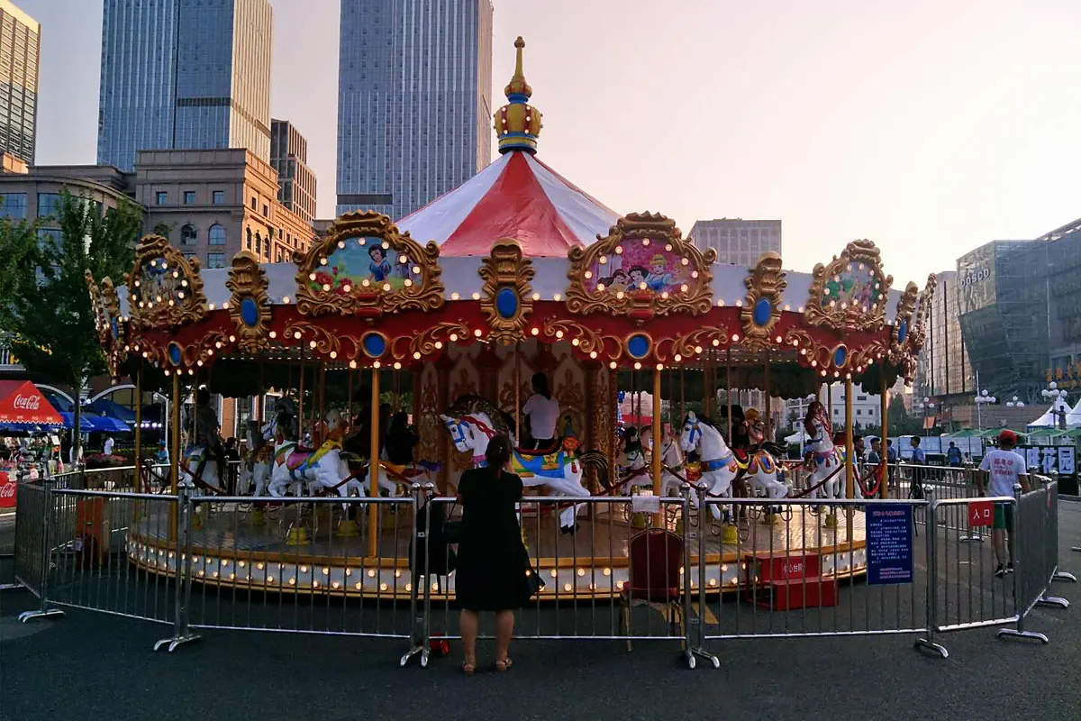 Merry go round carousel attraction at a fairground