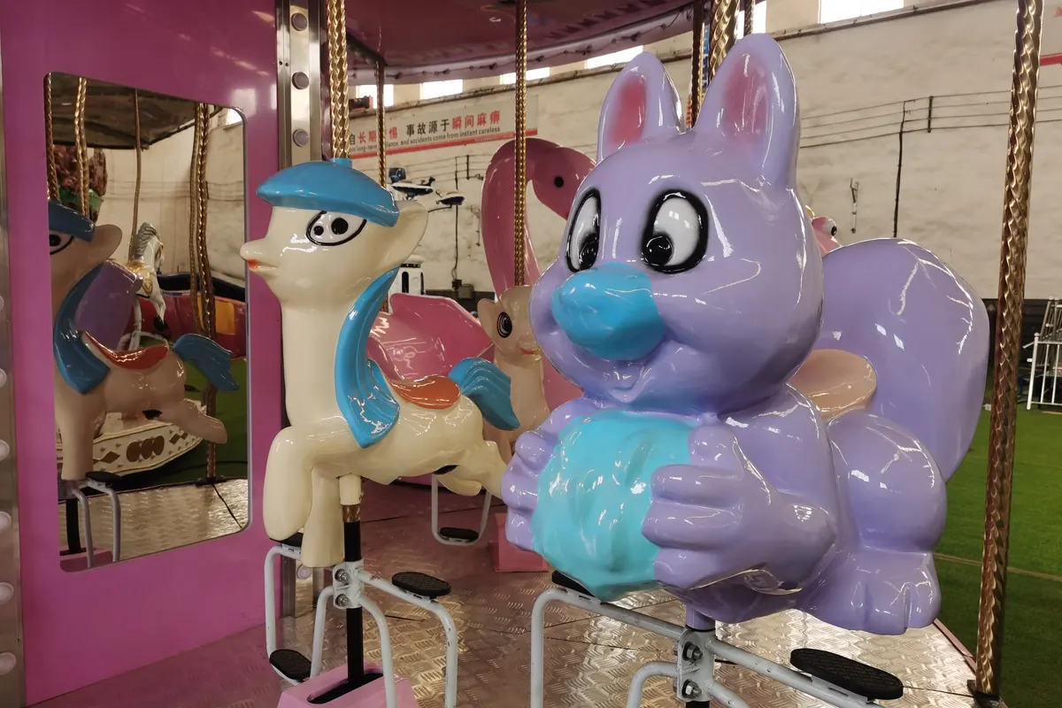 Pink themed carousel ride for family parks